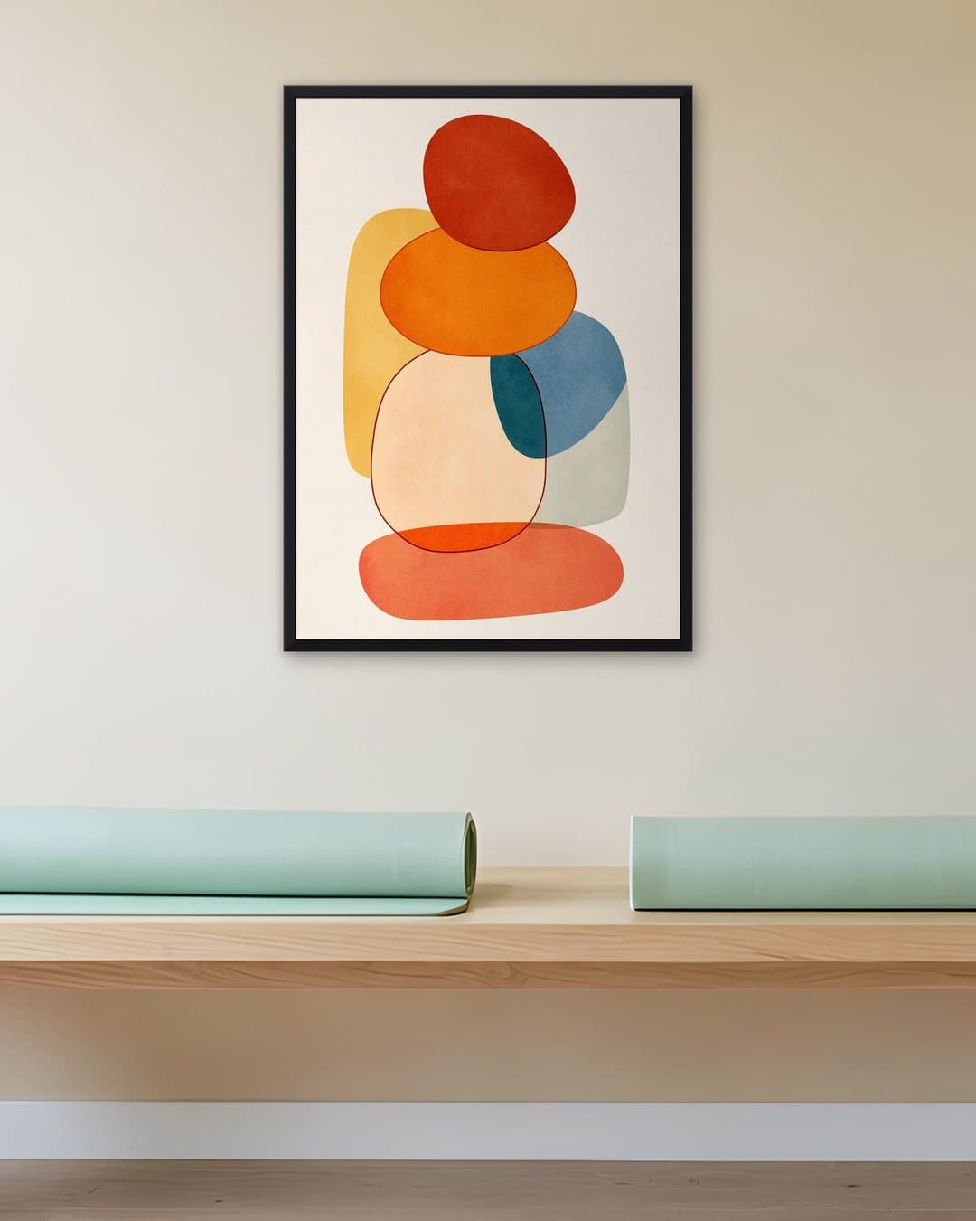 Sıcak Tonlarda Denge Taşları tablosu yoga stüdyosu duvarında: 50 × 70 cm, siyah ahşap çerçeve